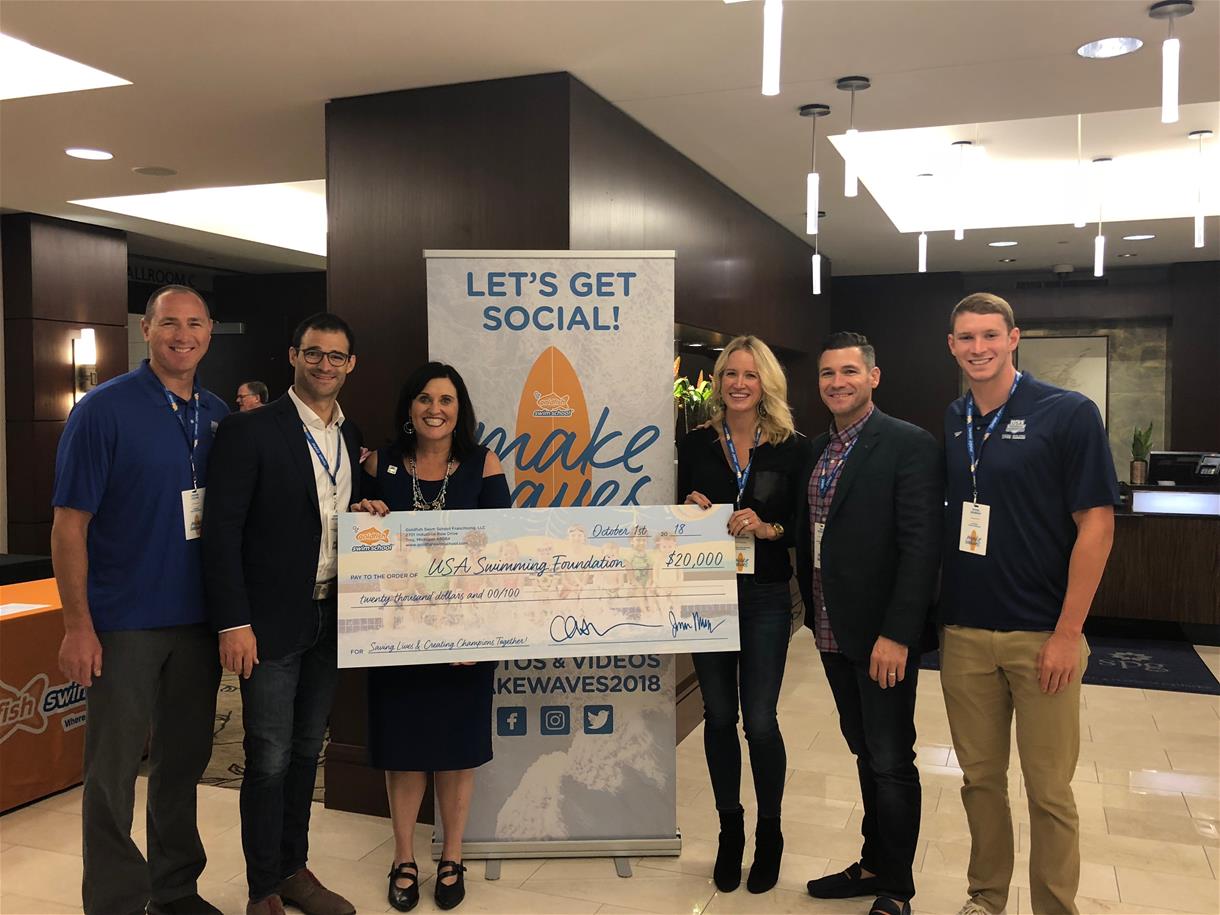 Goldfish Swim School Check Presentation to the Foundation