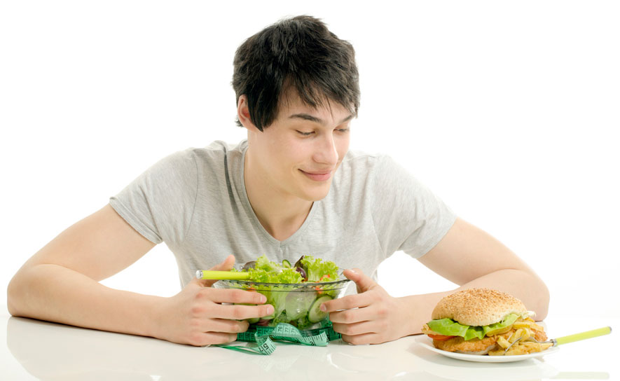 Teen with Salad Craving Chicken Sandwich